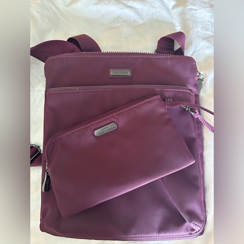 Baggallini crossbody bag with adjustable strap and matching cosmetic bag